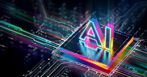 マイクロチップを内蔵したモジュールが虹色の光で照らされている画像。 「Ai」という文字がマイクロチップから飛び出し、同じ接続された虹色のライトで照らされる。